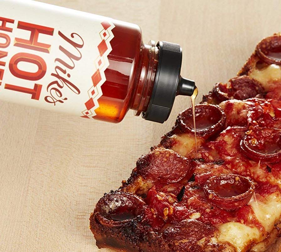 Drizzle hot honey on the pizza